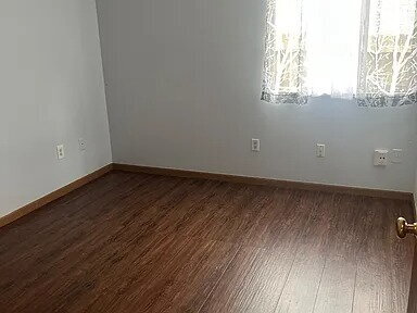 Building Photo - The home features beautiful LVP flooring, granite countertops, stainless steel appliances, and a ...