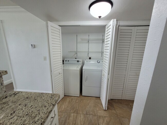 Indoor washer and dryer - 9143 SW 77th Ave