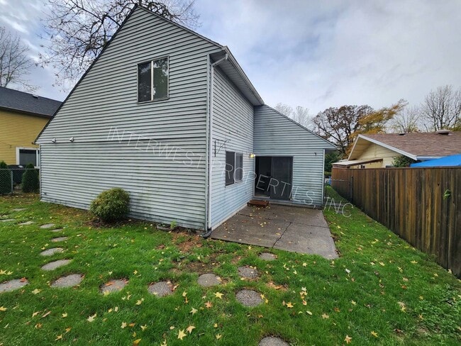 Building Photo - 3 Bd that Features Master on the Main with Fenced Yard, 2 Car Garage, & W/D Hookups