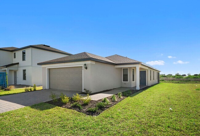Building Photo - Newly constructed property offers four spacious bedrooms, two full bath in Lehigh Acres