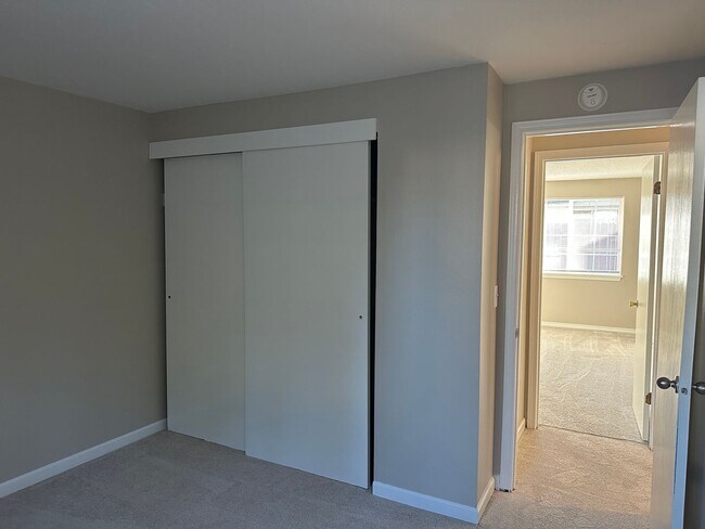 Building Photo - Spacious & Stylish 3BD Home with Iconic Stone Fireplace + Soaking Tub