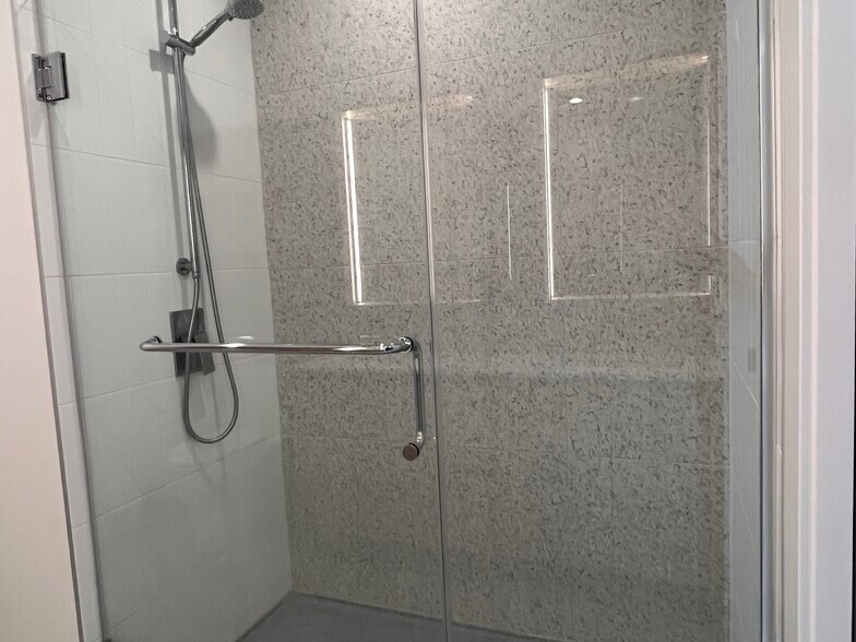 Standing shower in Primary Bathroom - 330 W Grand Ave