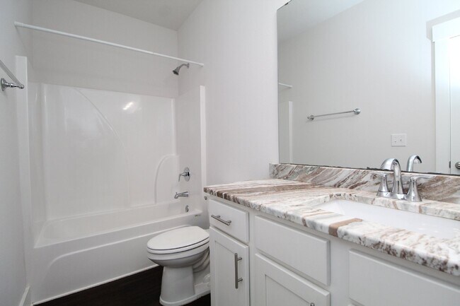 Building Photo - 3BR/2BA Cantonment New Construction Townhome with 2-Car Garage, Granite Kitchen & Low-Maintenance...