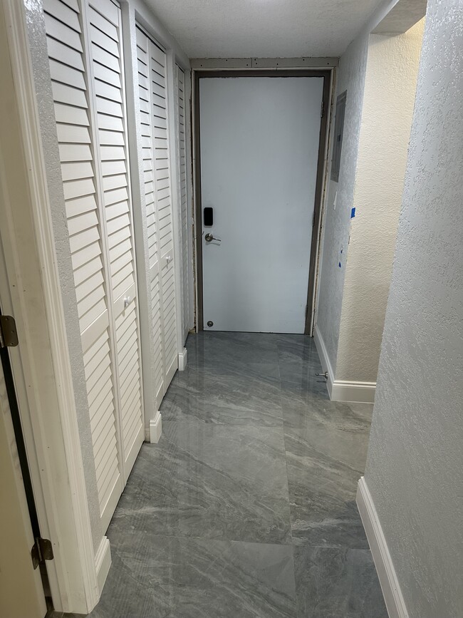 Hallway/front door - 8004 SW 149th Ave