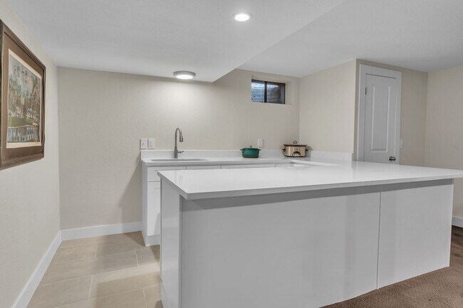 Building Photo - 4 Bedroom Home with Finished Basement, Chef’s Kitchen & Large Yard in Hampden Heights