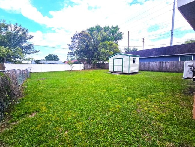 Building Photo - Stunning 4 Bed 1 Bath Block Home on Fenced Lot with Fruit Trees