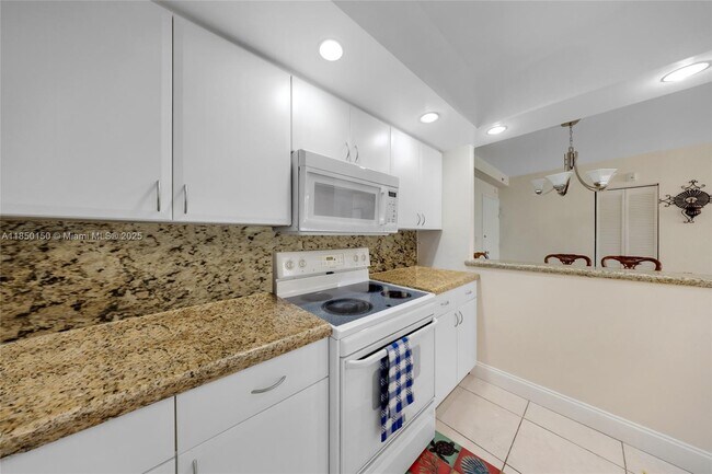 Building Photo - 5600 Collins Ave