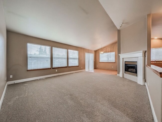 Building Photo - Move in ready 3 Bed 2 bath rambler w/ 2 car garage & fenced backyard!