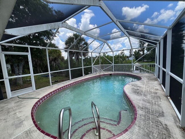 Building Photo - ANNUAL, UNFURNISHED * POOL * CANAL ** AVAIL 8/1/26 * 3 BEDS/2 BATHS * $2,095/month
