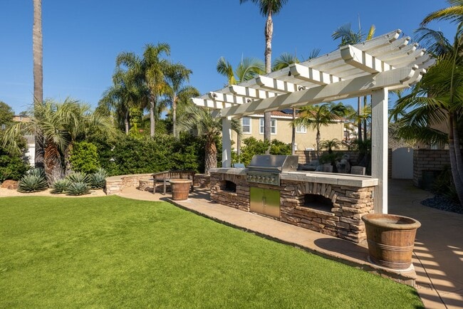 Building Photo - Coastal Retreat in La Costa - Spacious Home with Backyard Oasis