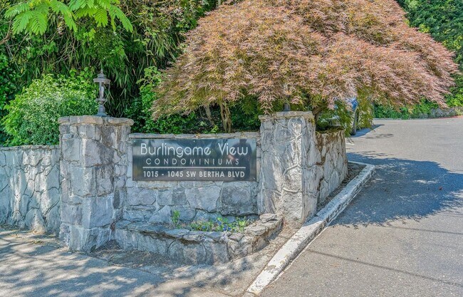 Building Photo - Spacious 2-Bedroom Condo with Forest Views, Private Balcony, In-Unit Laundry & Community Amenitie...