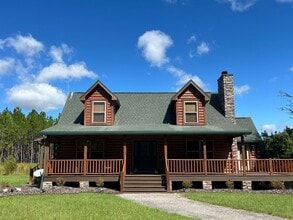 Building Photo - Gorgeous 3-Bedroom Log Cabin with Loft, La...