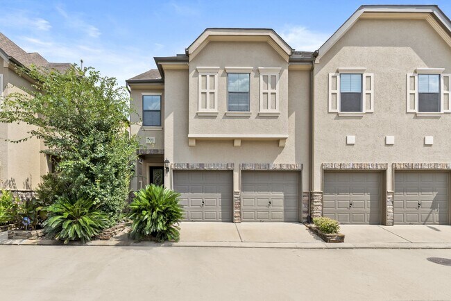 Primary Photo - Stylish 3-Story Townhome with Covered Outd...