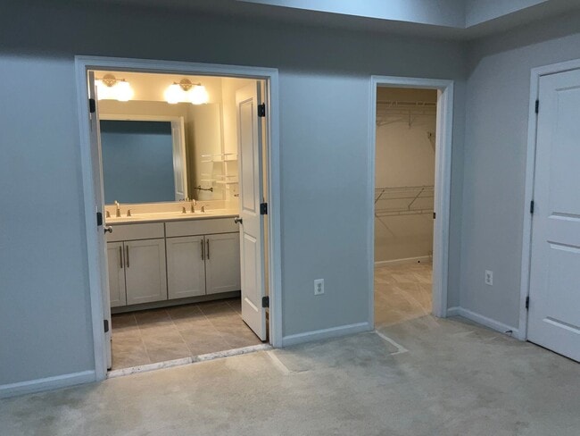 Building Photo - Beautiful 4BR 3.5BA 3 level townhome with 2 car attached garage located in the Cabin Branch Commu...