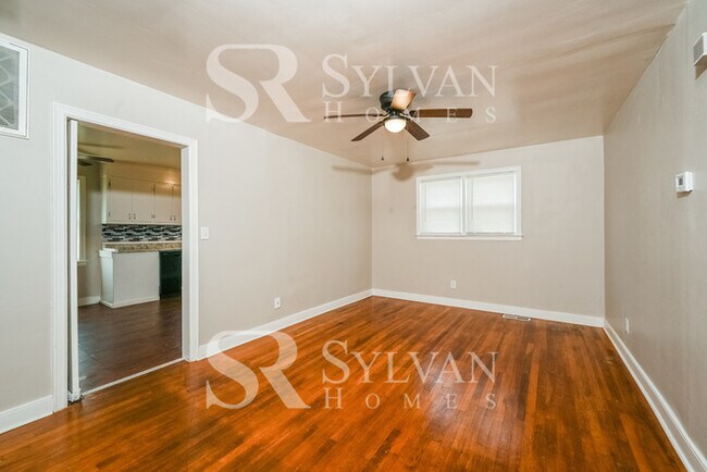 Building Photo - The living is easy in this 4 bedroom, 1.5 bathroom home