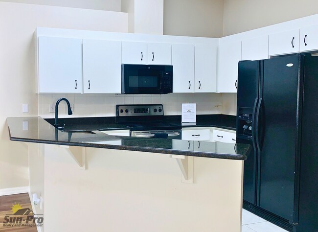 Building Photo - 5988 Sawgrass Point Dr