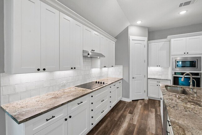 Building Photo - Modern Living Meets Small-Town Texas Charm