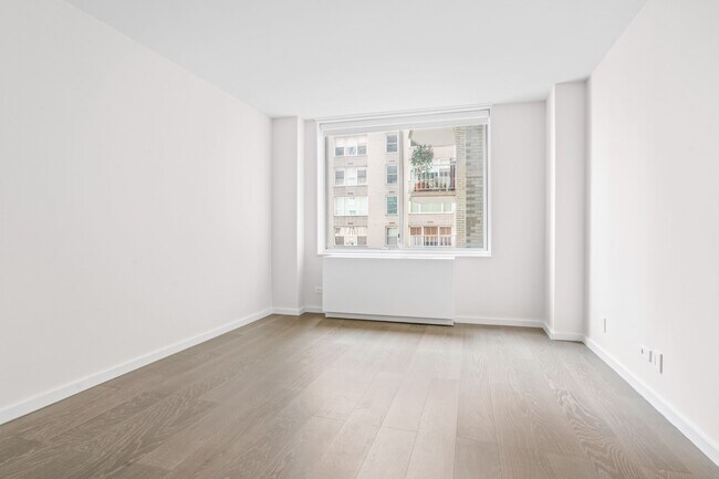 Building Photo - 220 E 65th St