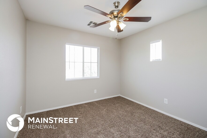 Building Photo - 8341 W Hughes Dr