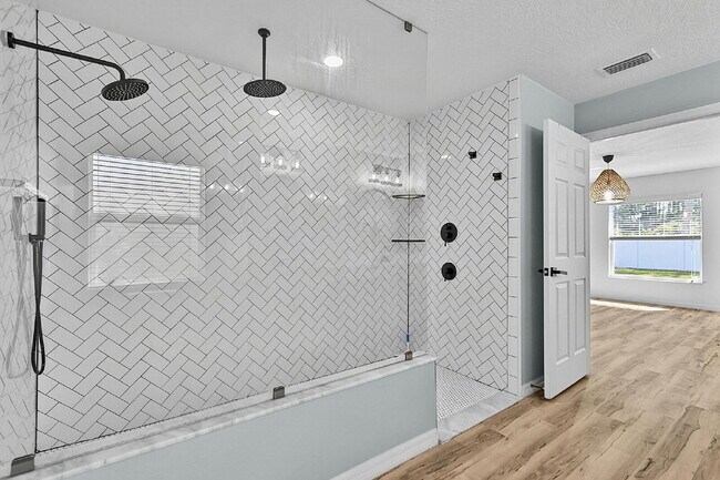 Building Photo - Modern 4-Bedroom, 3-Bath Home with Private In-Law Suite – Palm Coast, FL