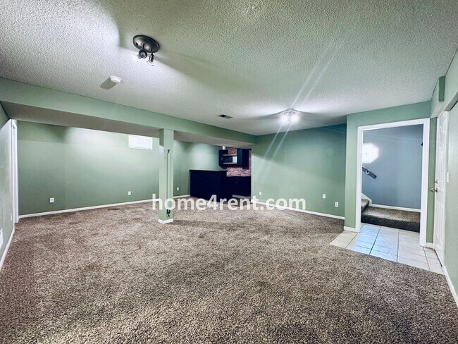 Building Photo - Overland Park Raised Ranch, Primary Suite ...