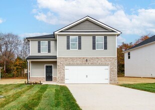 Building Photo - Beautiful 5 Bedroom, 2.5 Bath New Construc...