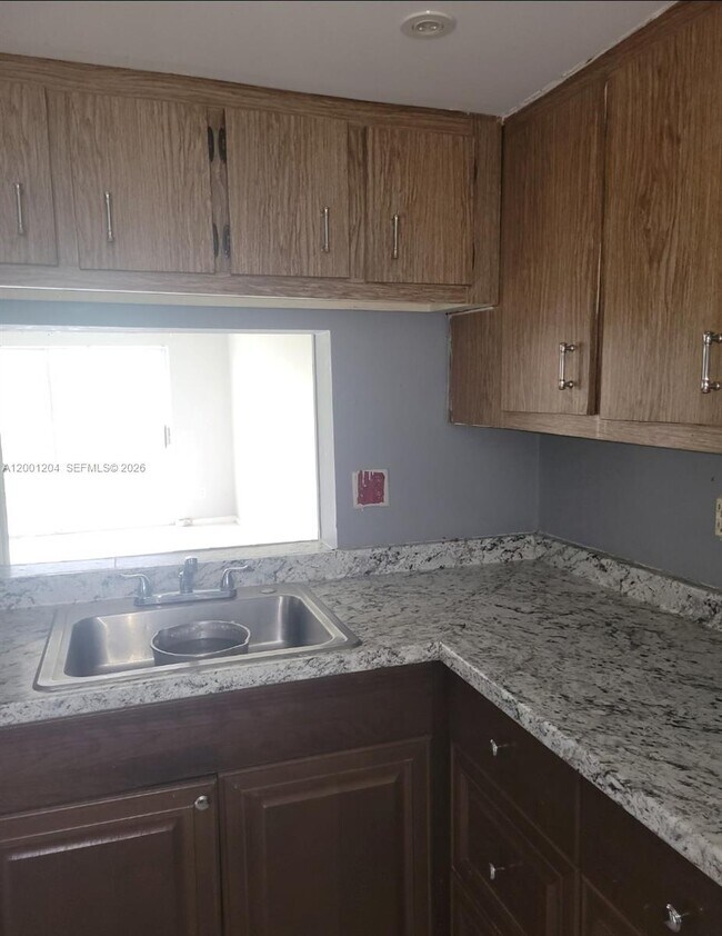 Building Photo - 2800 NW 56th Ave