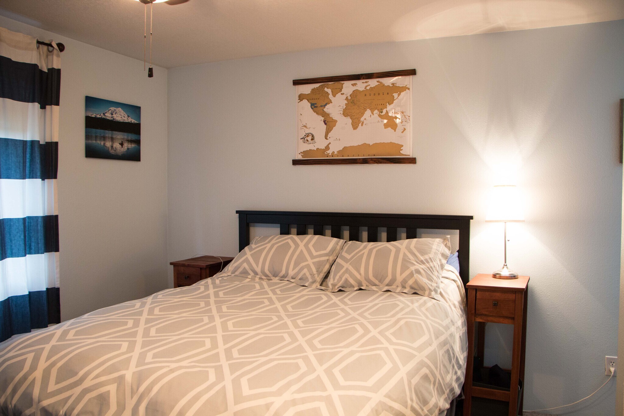 Master suite with skylight and bathroom. - 3306 Northeast Holman Street