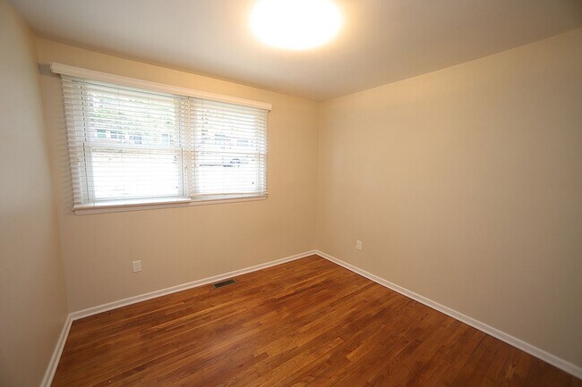 Building Photo - Charming and Cozy 3-Bedroom Racnh Home in Prime Raleigh Location with FENCED BACKYARD!!