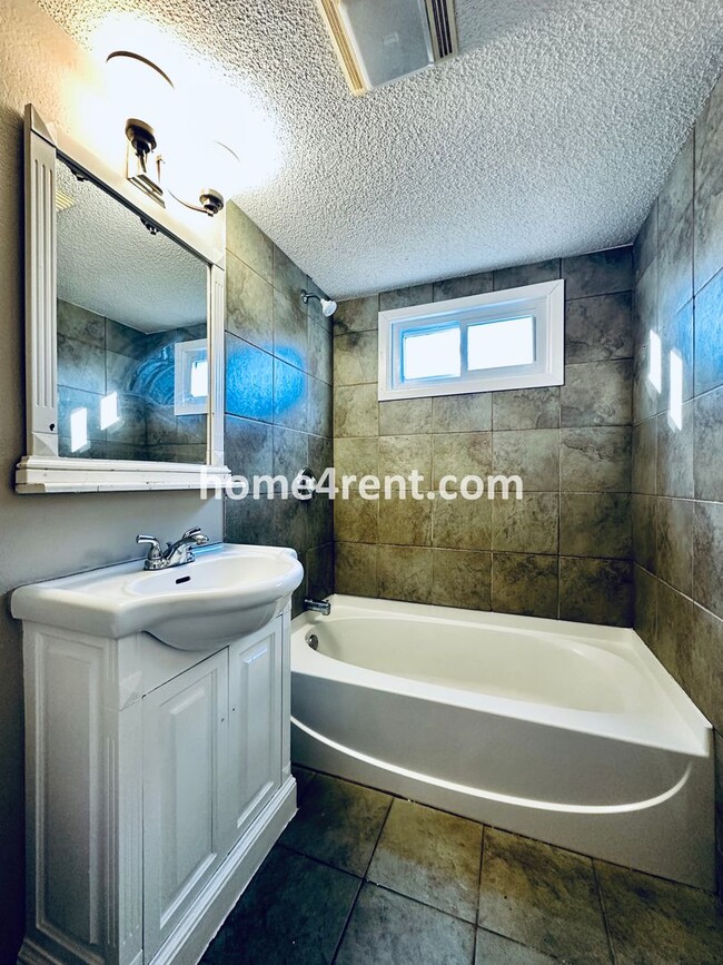 Building Photo - Adorable Home Featuring Wood Floors, SS Ap...