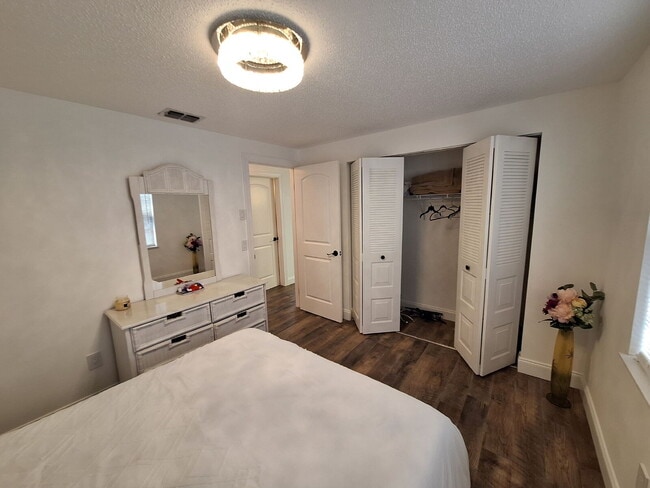 Building Photo - Second Floor Annual rental available now in the 55+ condominium community of Cedar Woods.