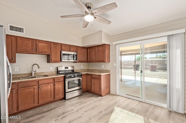 Building Photo - 7045 E Wilshire Dr