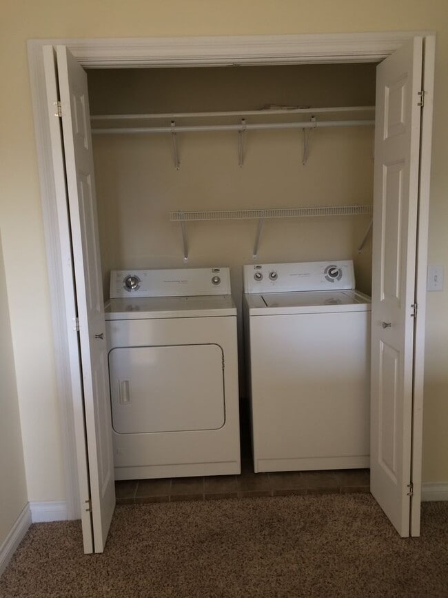 Building Photo - Live Large in This Spacious 2BR Townhome –...