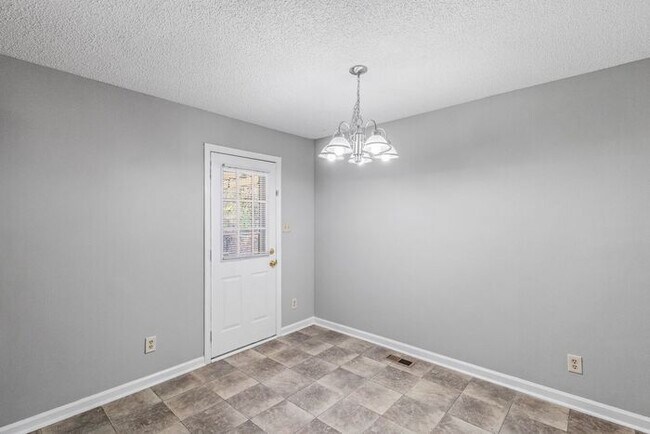 Building Photo - NE Home - Updated Kitchen and Bathrooms! SS Appliances, Fire Place, Front Porch & Deck, Fenced Yard!