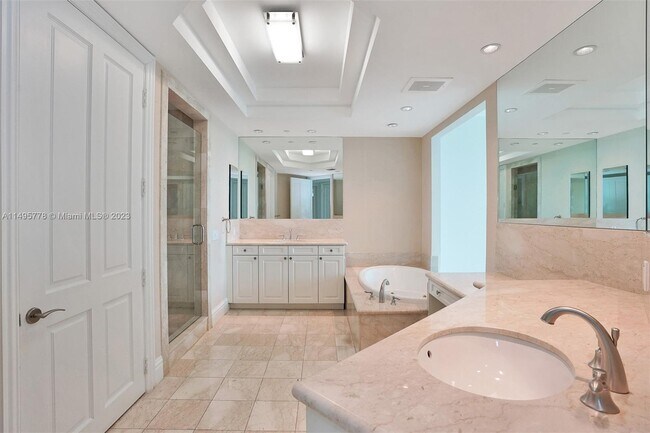 Building Photo - 10295 Collins Ave