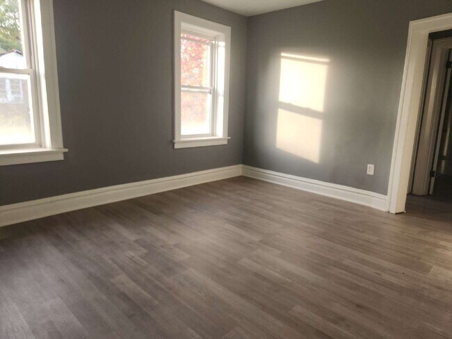 Building Photo - Charming & Spacious Updated Brick Home – P...