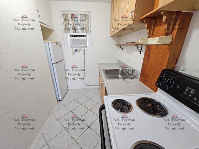 Building Photo - Studio/1 Bathroom Condo. 1 Assigned parking.