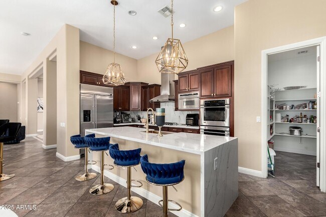 Building Photo - 4935 W Yearling Rd