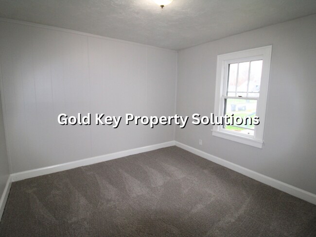 Building Photo - Large 2 BR 1 BA House with Family Room, Basement, Garage, and Separate Storage Building (SECTION ...