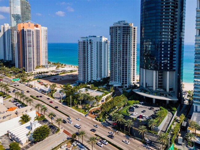 Building Photo - 18671 Collins Ave