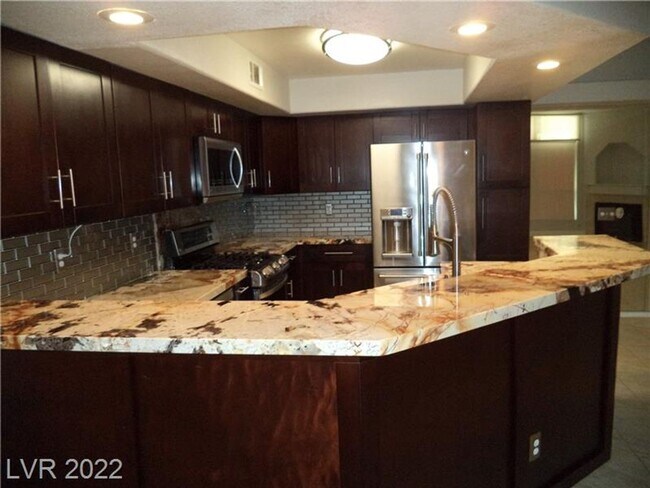 Building Photo - BEAUTIFUL FIRST FLOOR CONDO IN GATED COMMU...