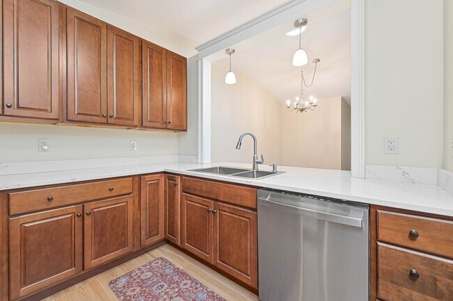 Building Photo - NOW AVAILABLE - 2/2 + Den Villa - 2 Car Ga...