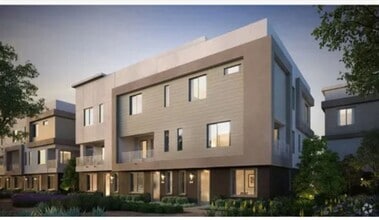 Building Photo - Beautiful furnished 4 bedroom Townhouse!