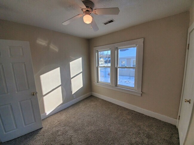 Building Photo - Rental home with deck, garage, and great backyard!