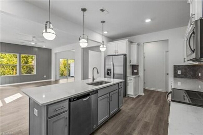 Building Photo - Spacious 3-Bedroom Townhome with Private Patio, Central HVAC & In-Unit Laundry Hookups