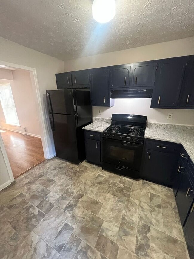 Building Photo - NOW READY!!! Cozy ranch 2 bedroom 1.5 bath...
