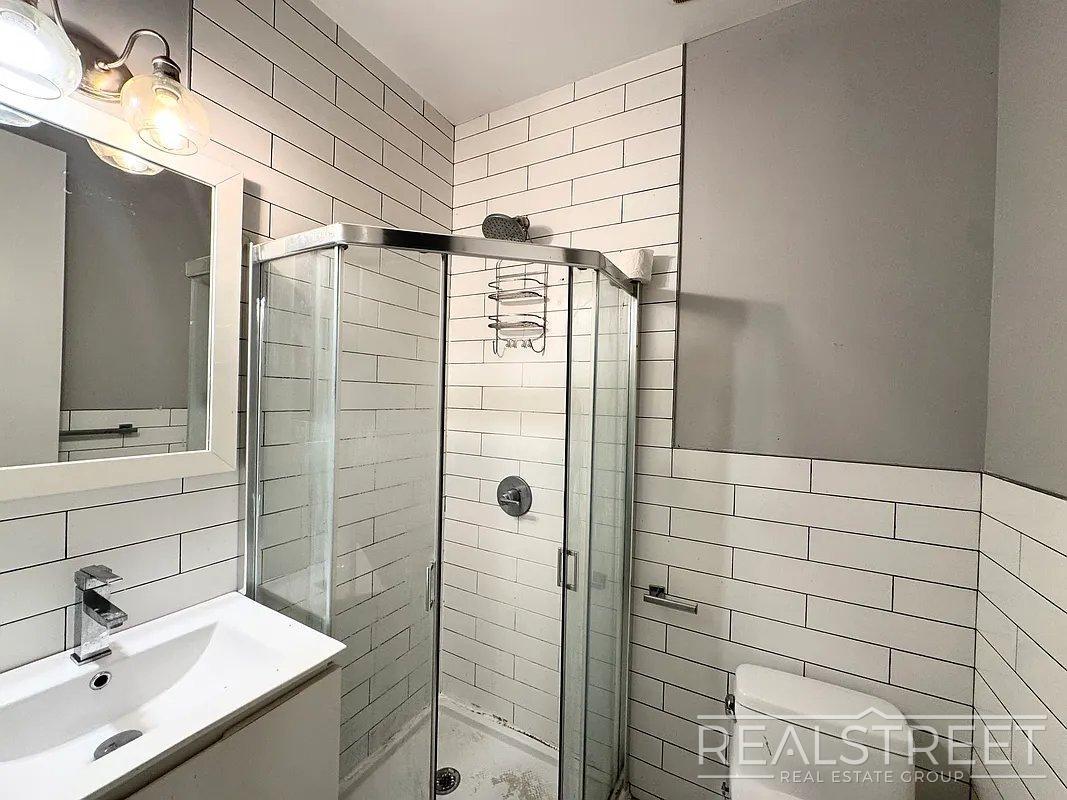 Building Photo - True 3 Bedroom layout — no flex, no railroad - Massive full-floor basement with second private entra