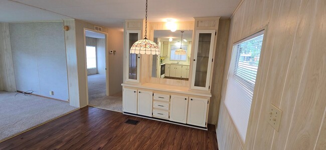 Building Photo - 2 bed 2 baths with carport