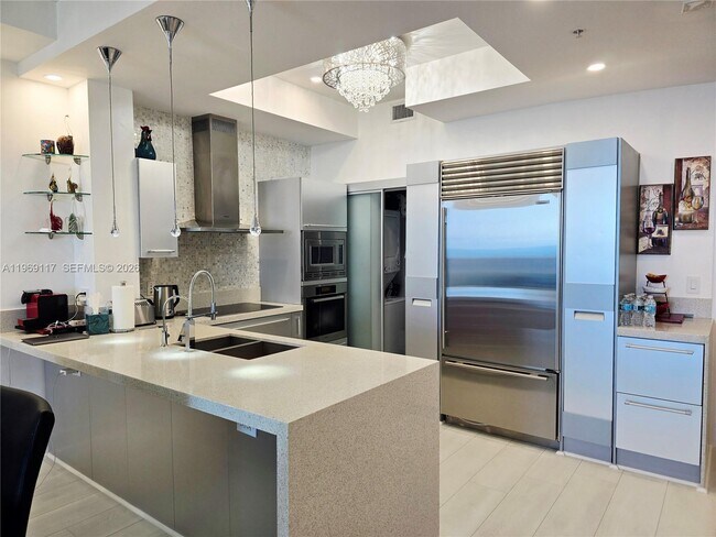 Building Photo - 18201 Collins Ave