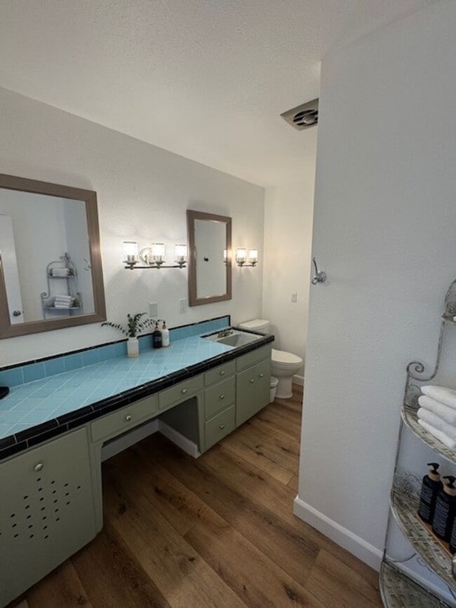 Building Photo - Beautifully Furnished and Recently Painted, Corner Lot Home Features a Fenced Backyard with an In...